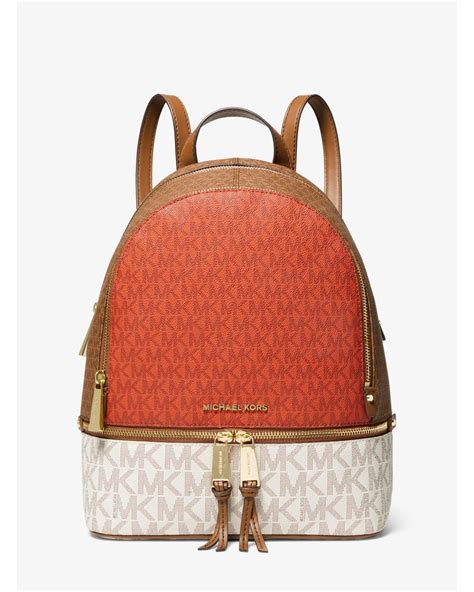 michael kors orange and white bag|Michael Kors orange backpack.